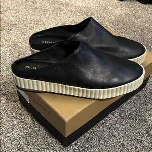 Kelsi Dagger Black Leather Mules with Cream Soles